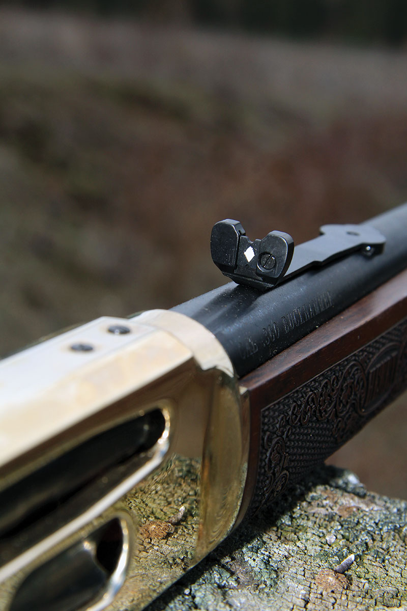 The Henry Side Gate Lever Action Rifle holds a quality semi-buckhorn rear sight, which can be adjusted for windage through a dovetail/set screw system, and for elevation via a screw and sliding insert.